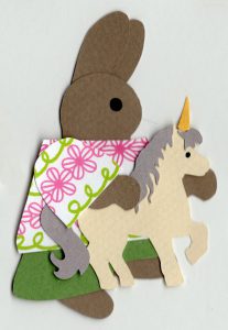 U for unicorn, Rabbit holding a toy unicorn