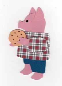 Cut paper illustration of an anthropomorphic pig holding a cookie